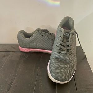 Lightly worn dark green with pink “geo tech” sole nobull trainers